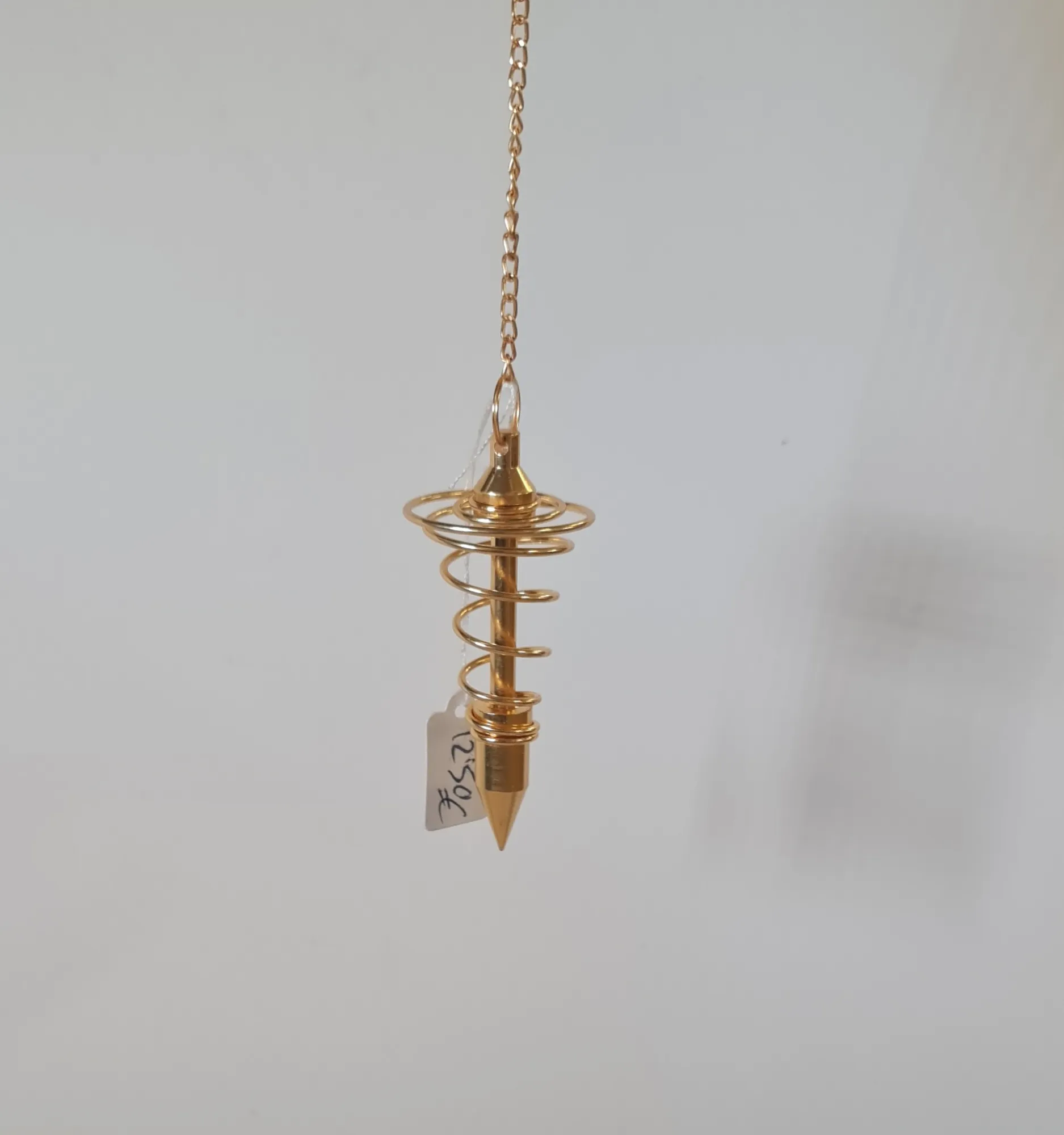 Péndulo espiral bronce