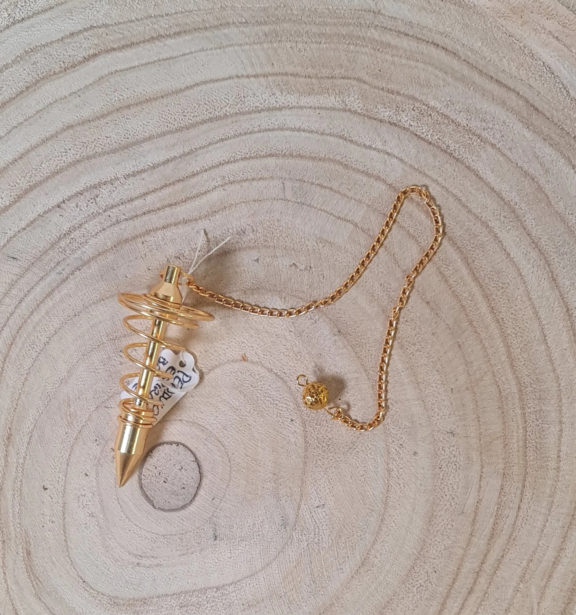 Péndulo espiral bronce