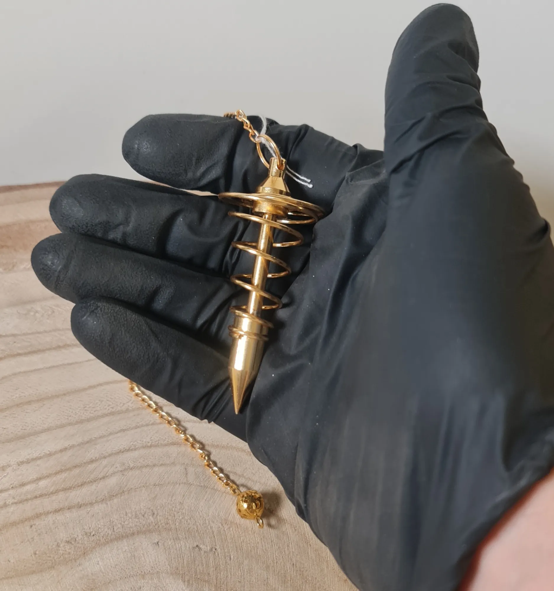 Péndulo espiral bronce