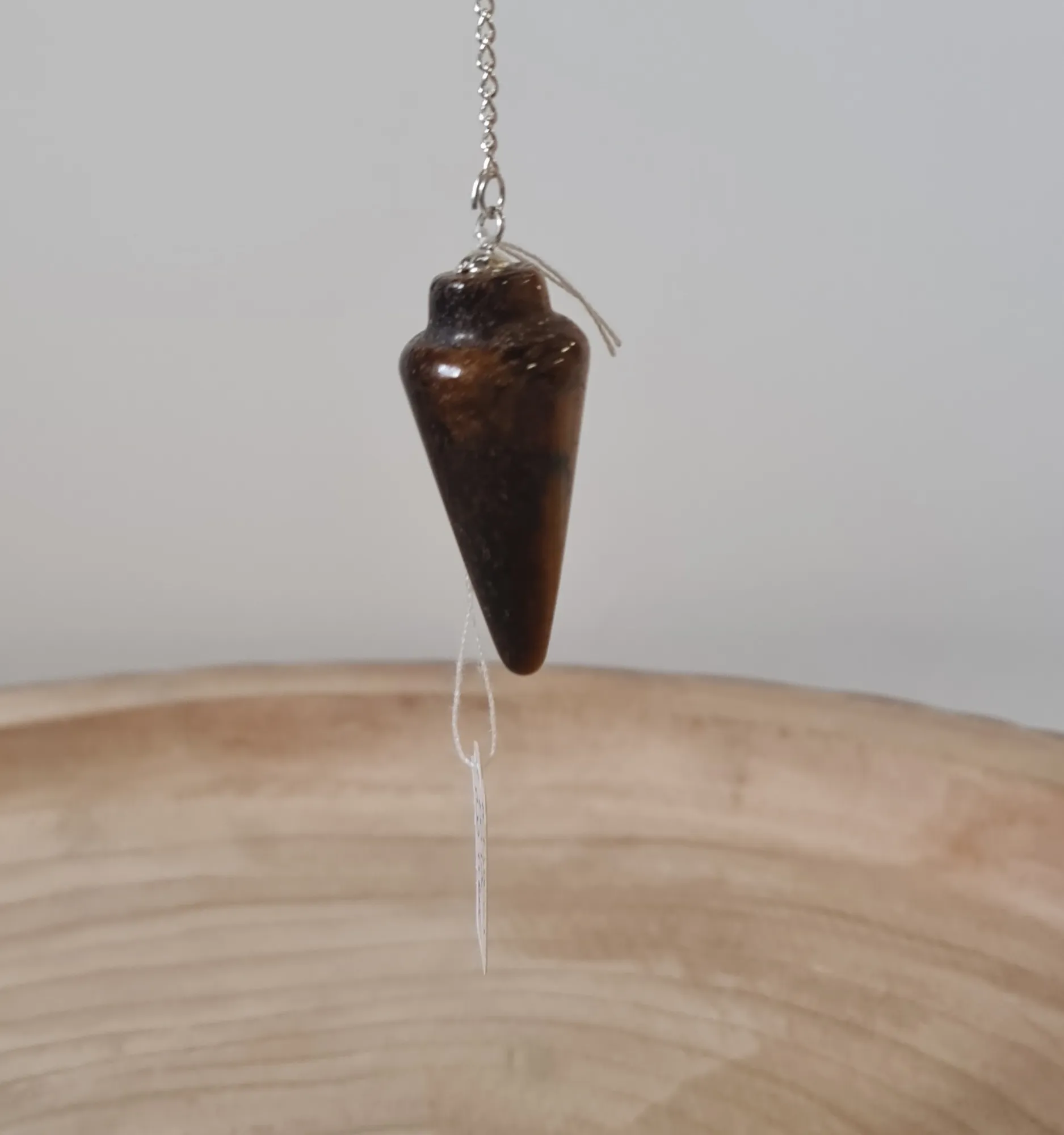 Péndulo gota ojo de tigre