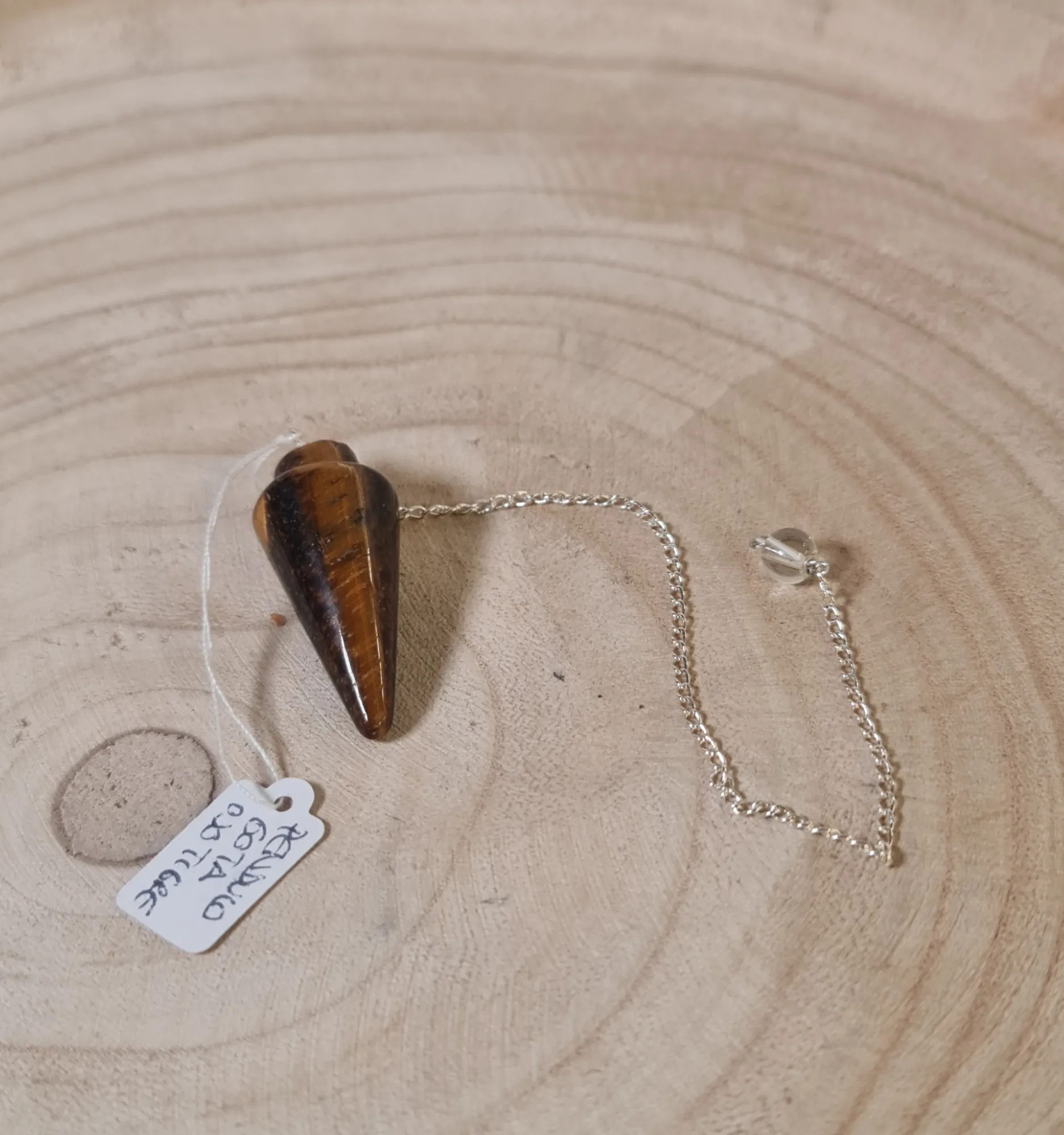 Péndulo gota ojo de tigre