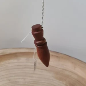 Péndulo madera karnak
