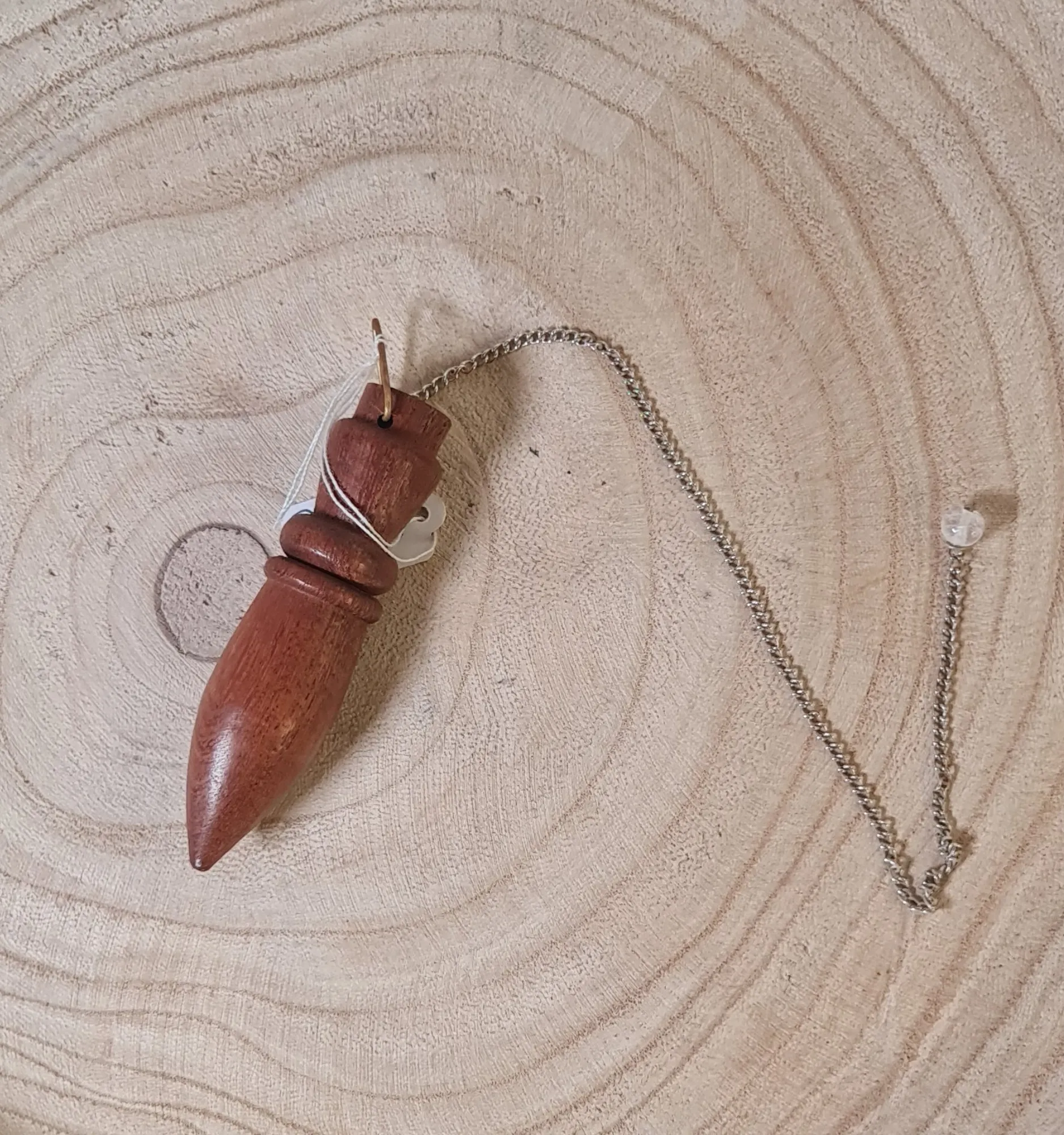 Péndulo madera karnak