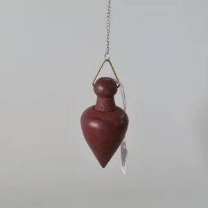 Péndulo madera lucy