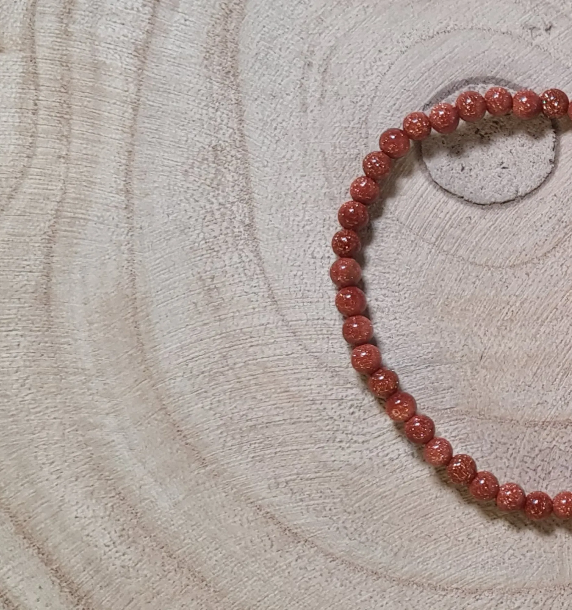 Pulsera de venturina dorada