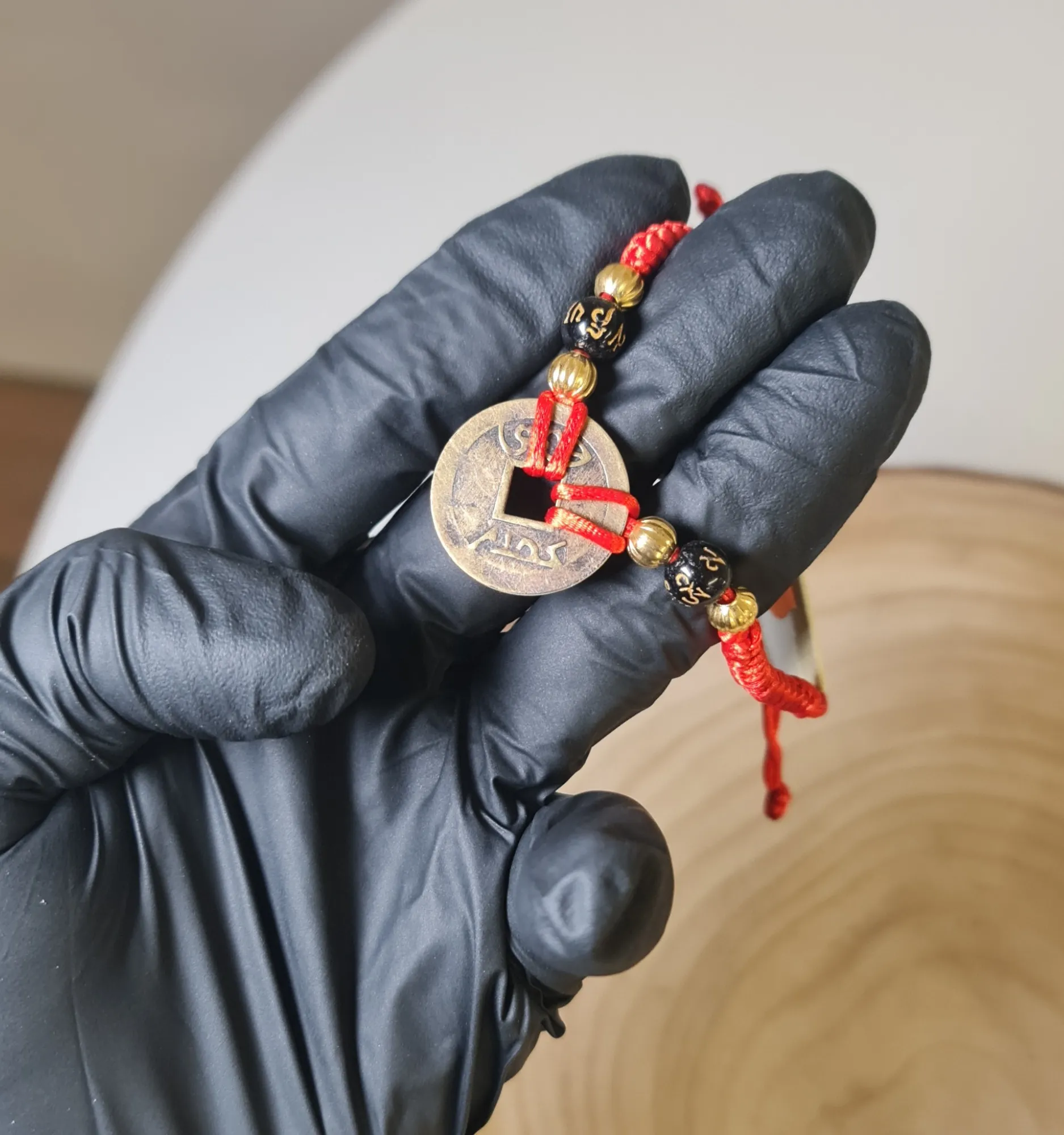 Pulsera moneda china