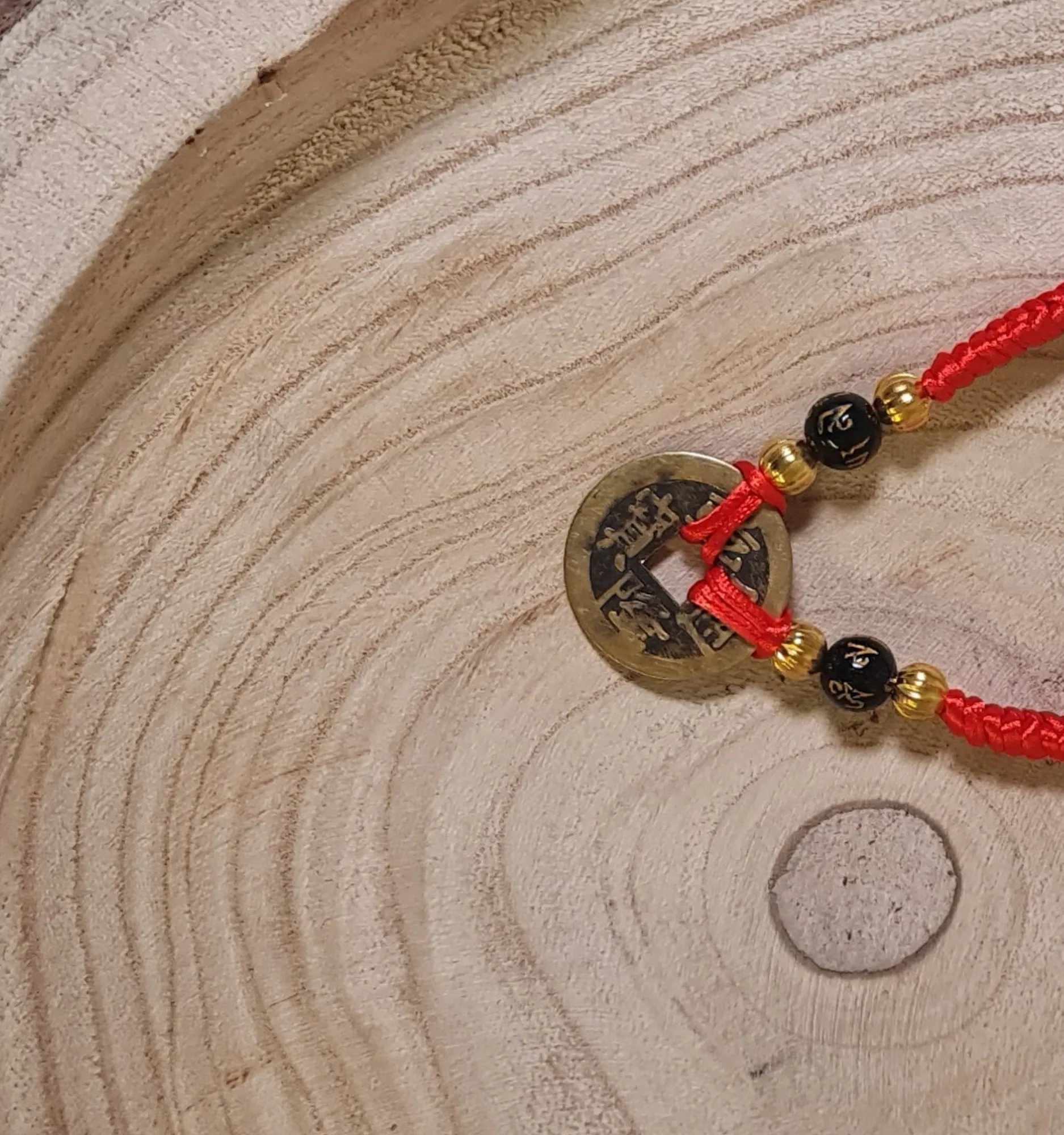 Pulsera moneda china