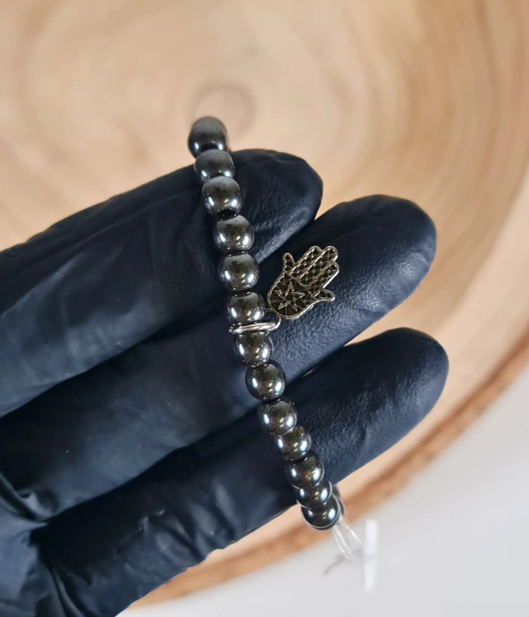 Pulsera Hematita 8mm con Mano de Fátima