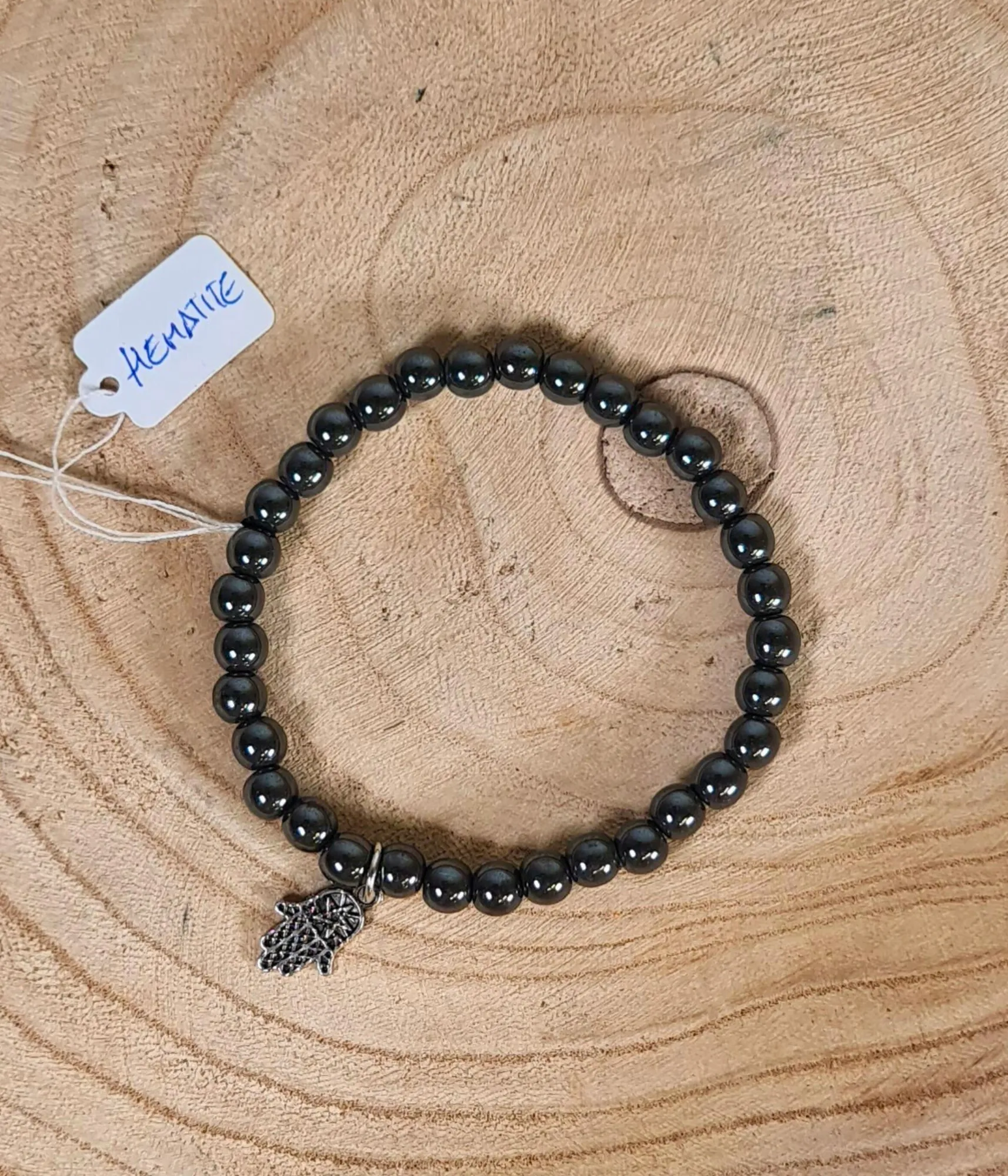 Pulsera Hematita 8mm con Mano de Fátima